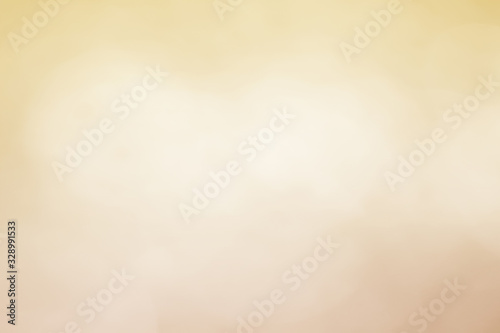 Abstract bokeh sparkle on yellow and gold background