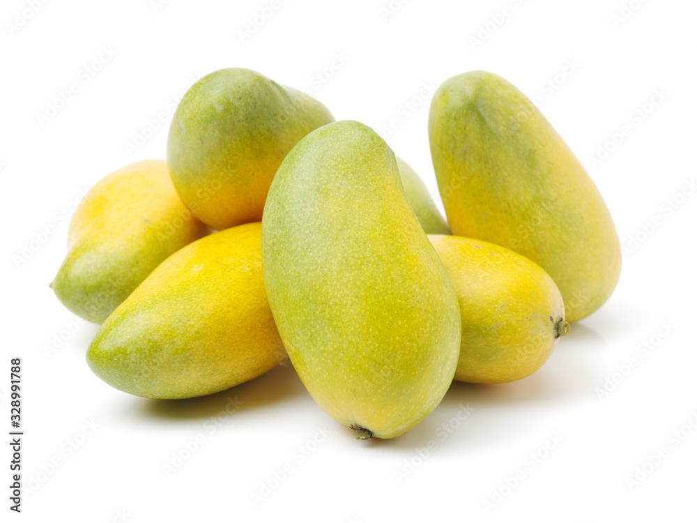green mangoes on white background.