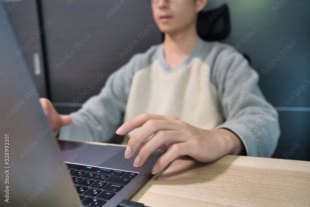 young man using a laptop young man using a laptop