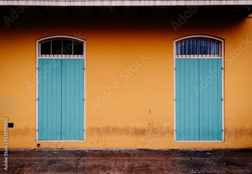 Strorm Window Shutters on Building Wall