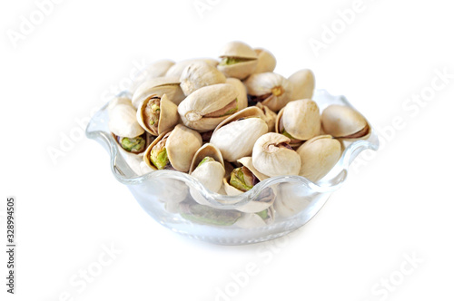 Pistachio in glass bowl  white background