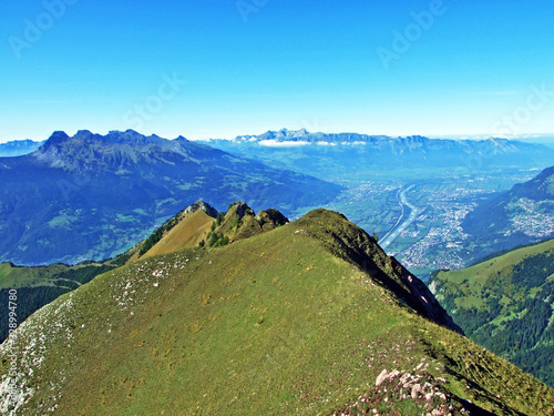 Alpine peak Mittlerspitz in the Ratikon border mountain massif or Rätikon Grenzmassiv, Mainfeld - Canton of Grisons (Graubünden or Graubuenden), Switzerland photo