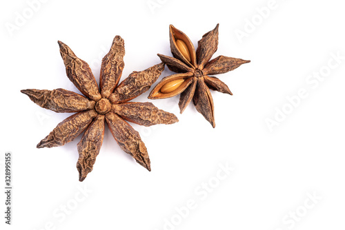 Star AniseStar Anise pods isolated on a white background, front and back detail closeup, macro, popular aromatic spice with medicinal properties.