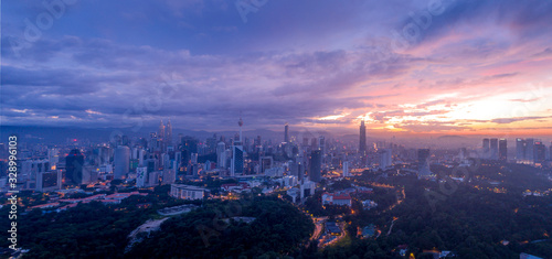 Aerial Panoramic view of Kuala Lumpur with majestics sunrise at changkat tunku. © anwar