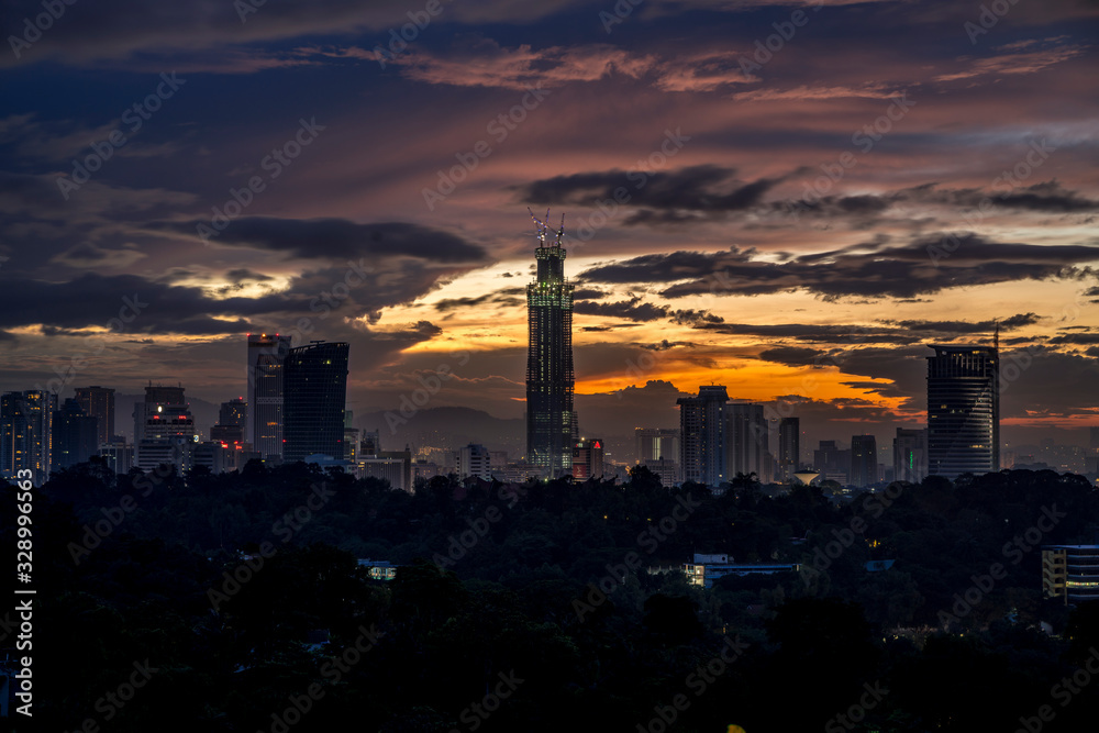 majestic sunrise over kuala lumpur, malaysia city skyline