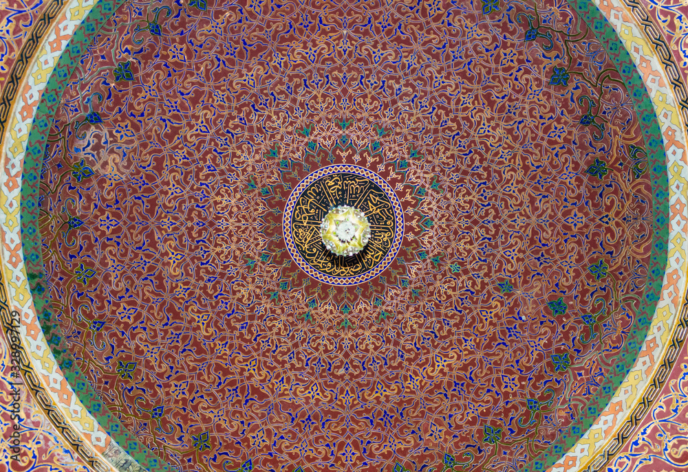 Istanbul, Turkey - CIRCA 2013: Intricate pattern on the ceiling inside one of the buildings in Topkapi palace, Istanbul.