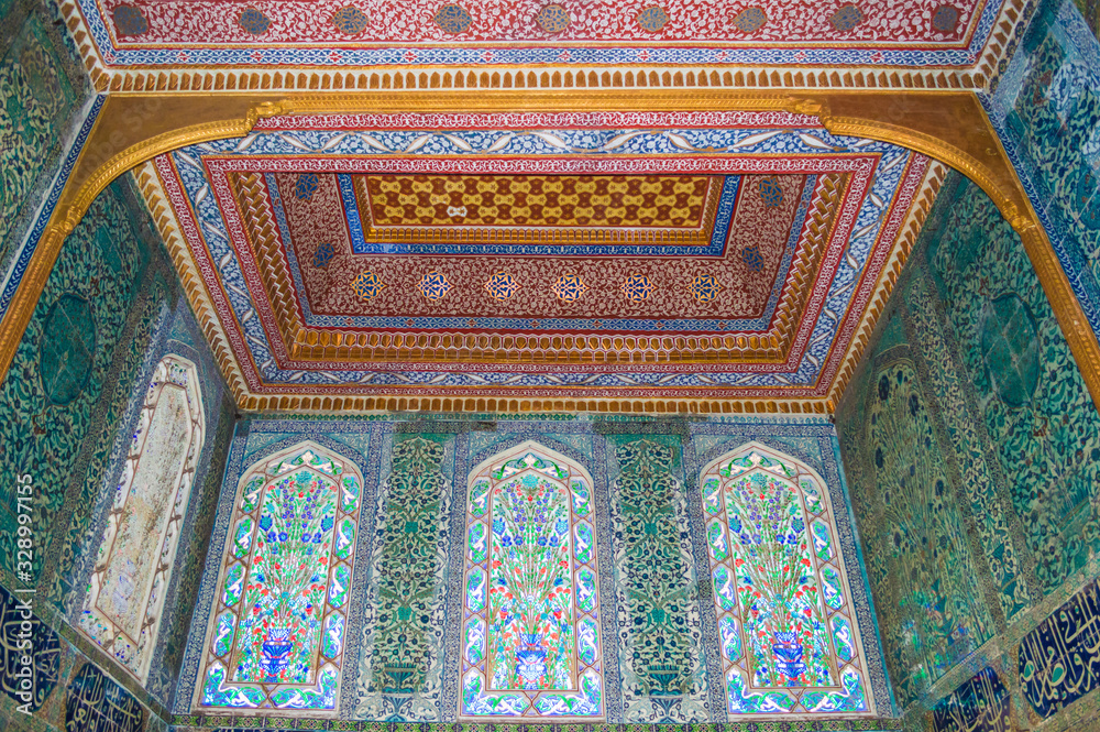 Istanbul, Turkey - CIRCA Nov 2013: Interior of a room in Topkapi palace, istanbul, Turkey; with ornate decoration and calligraphy.