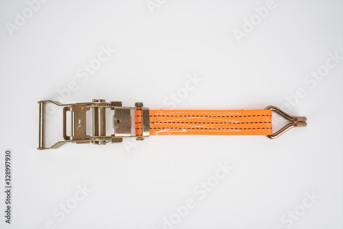 The sling for fastening cargoes is isolated on a white background.tie down strap ratchet photo