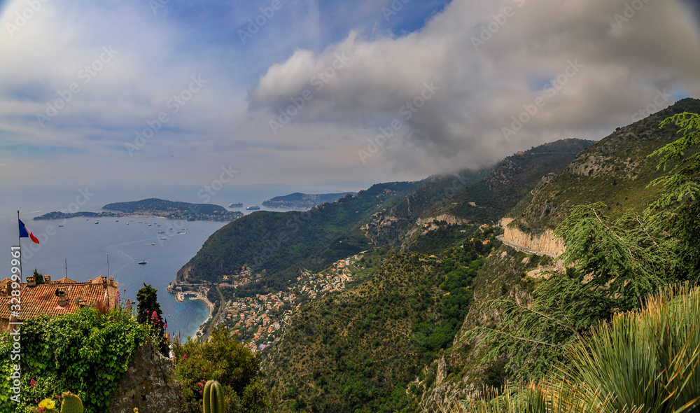 Panorama of the Mediterranean coastline and medieval houses from the top of the Eze village town on the French Riviera