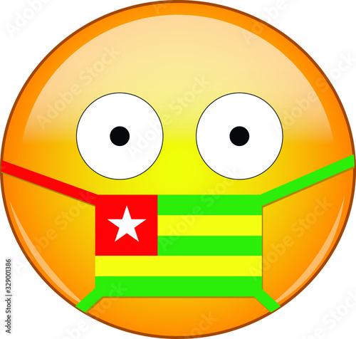 Yellow scared emoji in Togolese medical mask protecting from SARS, coronavirus, bird flu and other viruses, germs and bacteria and contagious disease as well as toxic smog in Togo.