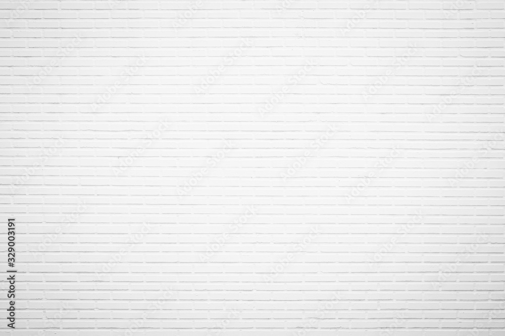 White brick wall texture background in room at subway. Brickwork stonework interior, rock old clean concrete grid uneven abstract weathered bricks tile design, horizontal architecture wallpaper.