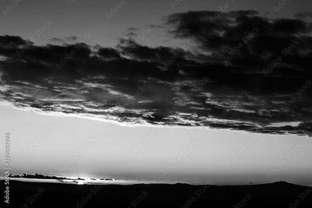 Sunset over mountains and valley Sunset over mountains and valley