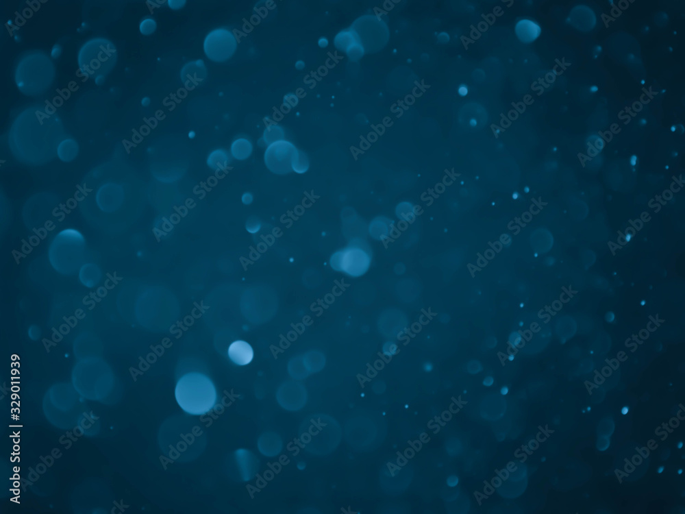 The blue bokeh on the background blurred. The blue bokeh on the background blurred.