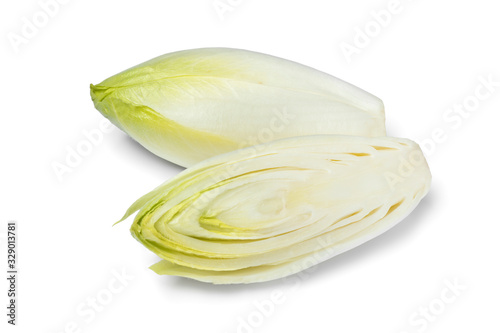 Schilderij op canvas Whole and half fresh raw Belgian endive