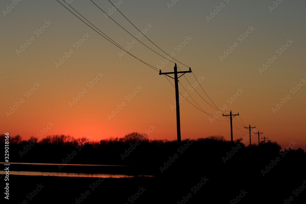 Kansas Sunset with Power Line silhouettes.