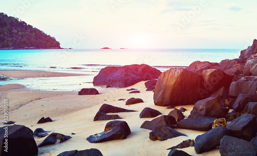 Paradise wild beach landscape  peaceful relaxing view  stunning nature scene. Huge boulders on a beach. Tioman Island  Malaysia.