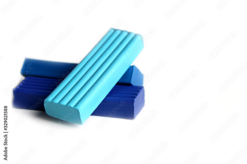 multi-colored plasticine on a white background. Educational games for children multi-colored plasticine on a white background. Educational games for children