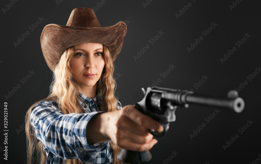 Wild cowboy girl with gun closeup Wild cowboy girl with gun closeup