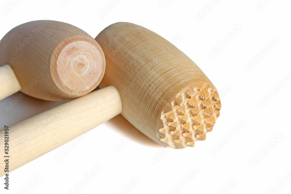 Wooden meat mallet. Isolated on white background. Wooden meat mallet. Isolated on white background.
