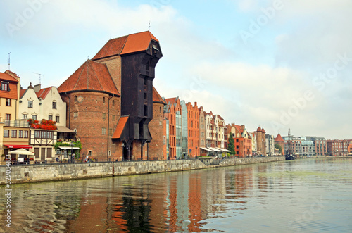 Motlawa River with medieval port crane in Gdansk, Poland