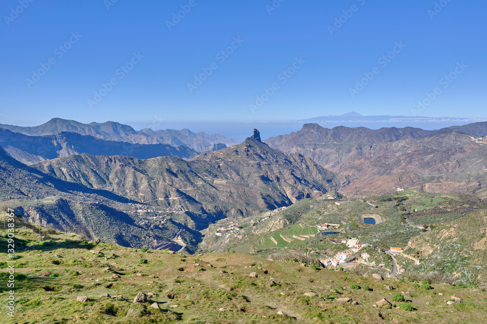 Scenic view of Pico de las Nieves - the highest peak on the island of Gran Canaria on Canary Islands in Spain. Beautiful summer sunny look of mountains of islands in Athlantic ocean