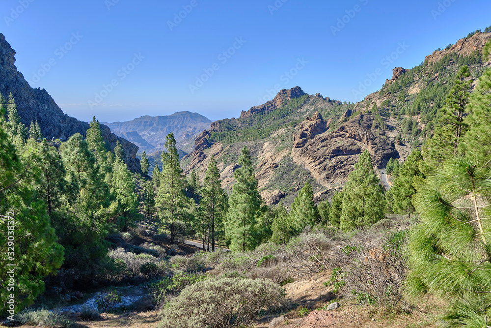 Scenic view of Pico de las Nieves - the highest peak on the island of Gran Canaria on Canary Islands in Spain. Beautiful summer sunny look of mountains of islands in Athlantic ocean
