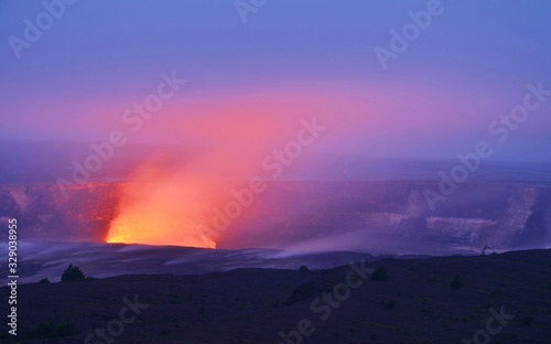 Red glowing volcanic eruption at night at Hawaii´s Volcano N.P.