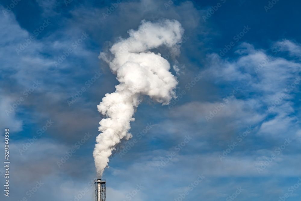 Smoke coming from the chimneys of the plant factory. Air pollution concept Smoke coming from the chimneys of the plant factory. Air pollution concept