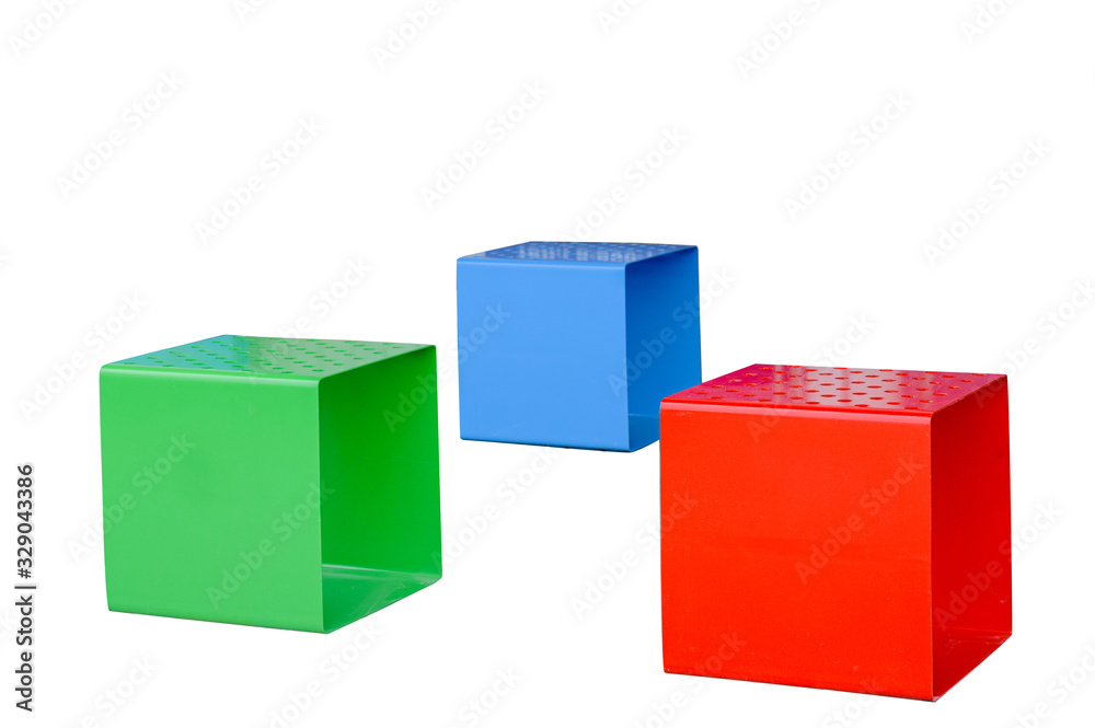 Metal cubes of different colors on a white background. Colorful cubes for sitting on an isolated background Metal cubes of different colors on a white background. Colorful cubes for sitting on an isolated background