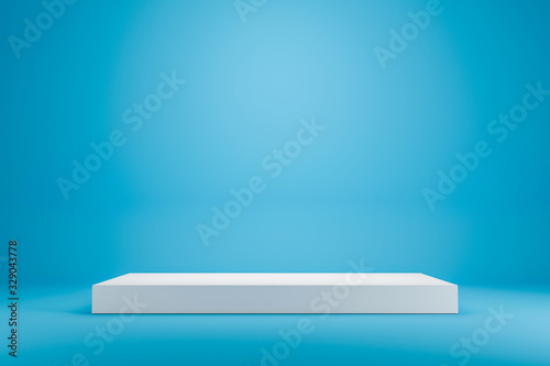White podium shelf or empty studio display on vivid blue summer background with minimal style. Blank stand for showing product. 3D rendering. © Lemonsoup14