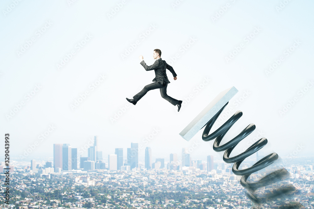 Businessman on start up mechanism. Businessman on start up mechanism.