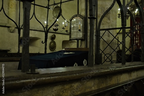 Staronova Synagogue, Prague, Czech Republic - 31 December 2019: details of the interiors of this old synagogue with chandeliers and gold decorations photo