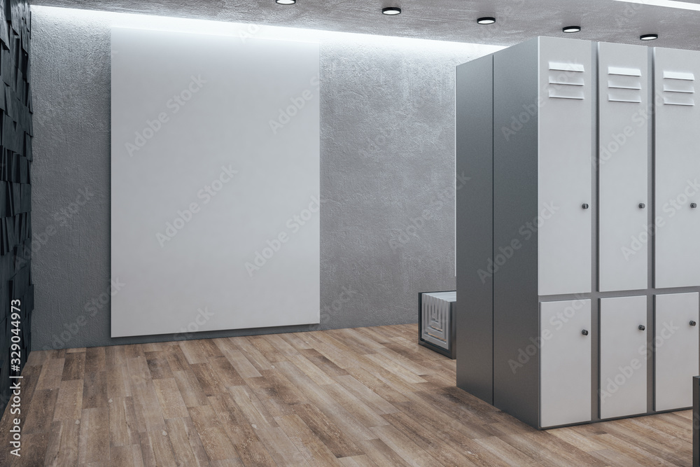 Modern locker room with blank poster on wall