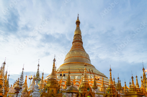 Domes of Shwedagon Pagoda against blue sky. Yangon, Myanmar (Burma). Travel Asia.