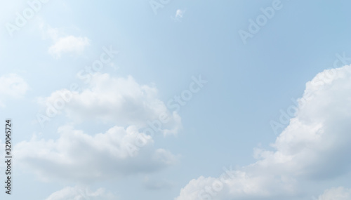 Fototapeta Naklejka Na Ścianę i Meble -  Light  blue cloudy sky wallpaper