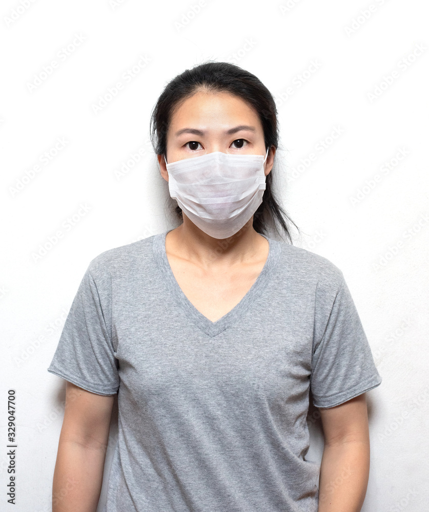 Asian business woman in casual with healthy face mark protect corona virus isolated on white background.The 2019-20 coronavirus outbreak is an ongoing outbreak of coronavirus disease 2019 (COVID-19). Asian business woman in casual with healthy face mark protect corona virus isolated on white background.The 2019-20 coronavirus outbreak is an ongoing outbreak of coronavirus disease 2019 (COVID-19).