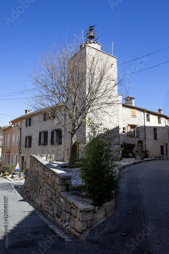 The bell tower in the medieval village of Cabris on the French riviera. photo