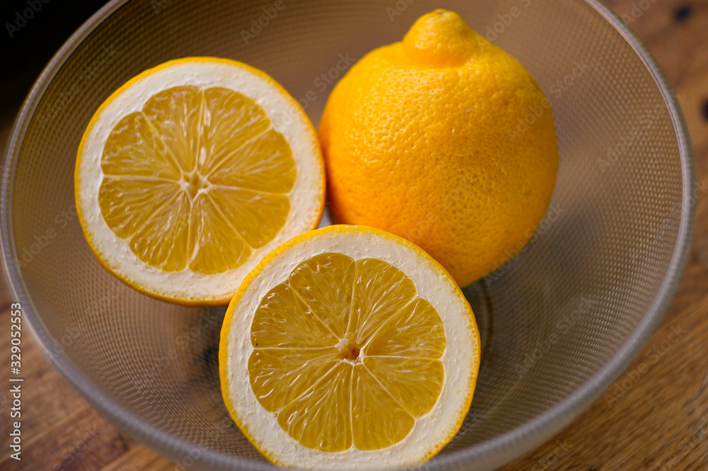 cup of tea and sliced lemon on a wooden table cup of tea and sliced lemon on a wooden table