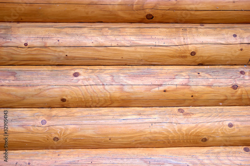 Old wood planks texture. Close up brown wooden house.