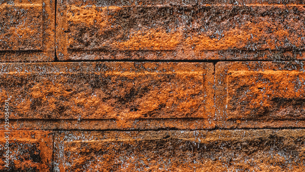 The surface texture of the old red brick. Old red brick wall for loft interior or exterior.Brick background close up The surface texture of the old red brick. Old red brick wall for loft interior or exterior.Brick background close up