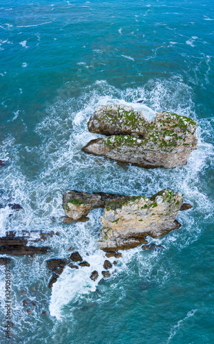 Aerial view of Islote de los Picones, Pendueles beach, Pendueles, Llanes council, Asturias, Cantabrian Sea, Spain, Europe photo