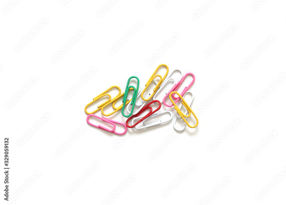 Colored paper clips on white background Colored paper clips on white background