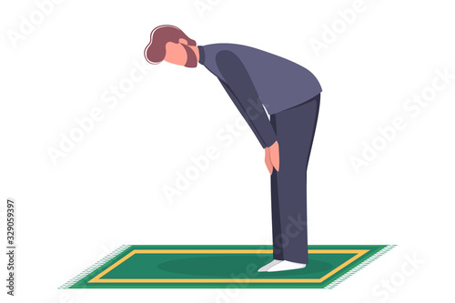 Muslim man praying position. Man in traditinal clothes