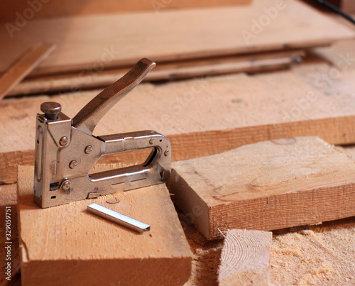 construction stapler with staples on construction site
