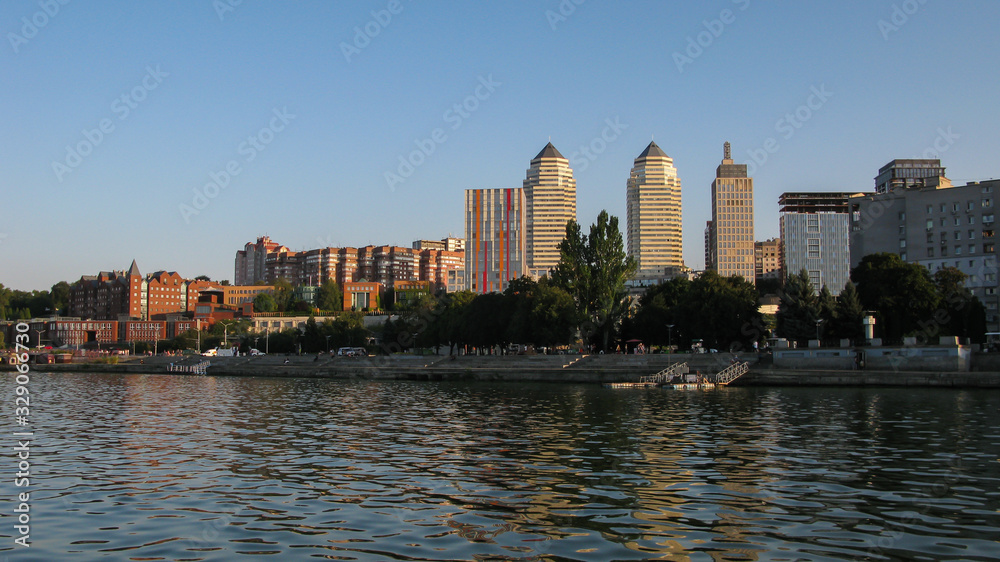 Obraz premium panoramic view from the Dnipro river to the city and the embankment of Dnipro city, Ukraine