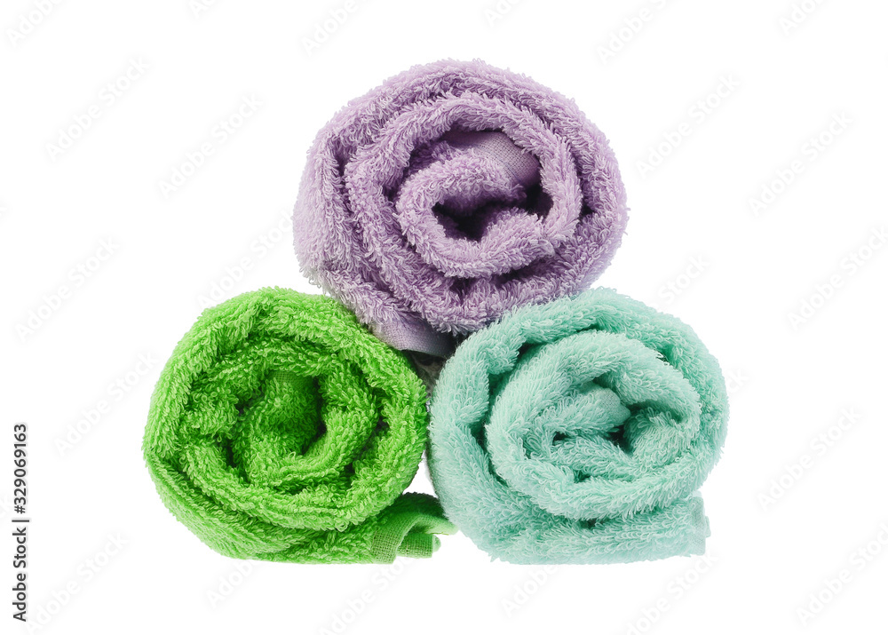 three twisted towels on the side white background three twisted towels on the side white background