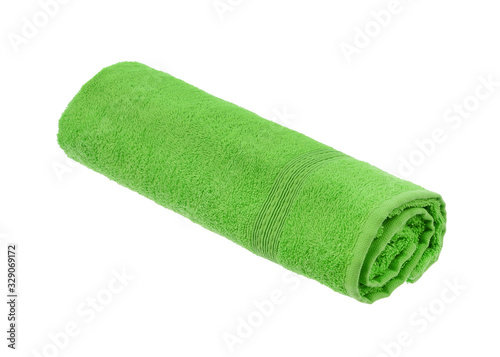 green twisted towel on a white background isolate