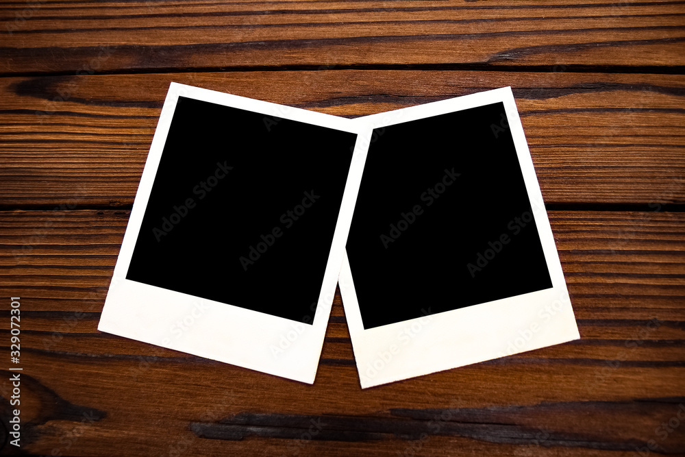 a Photo album nostalgia photography on a wooden background