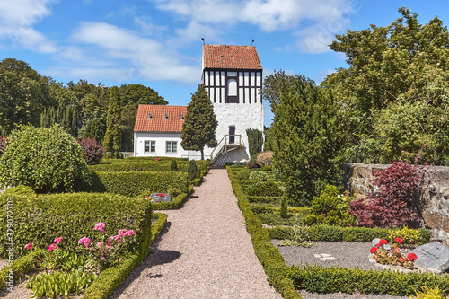 Belfry by the Ny Kirke (New Church) located in Nyker village, Bornholn island, Denmark. photo