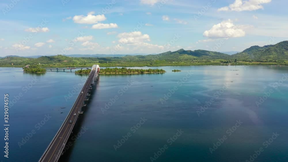 top view of the San Juanico Bridge. Landscape with a large bridge over the strait. Summer and travel vacation concept. top view of the San Juanico Bridge. Landscape with a large bridge over the strait. Summer and travel vacation concept.